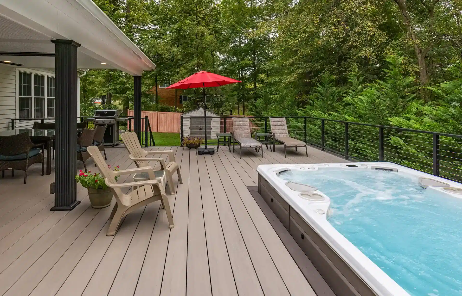 Photo of a sunken swim spa deck with outdoor furniture 