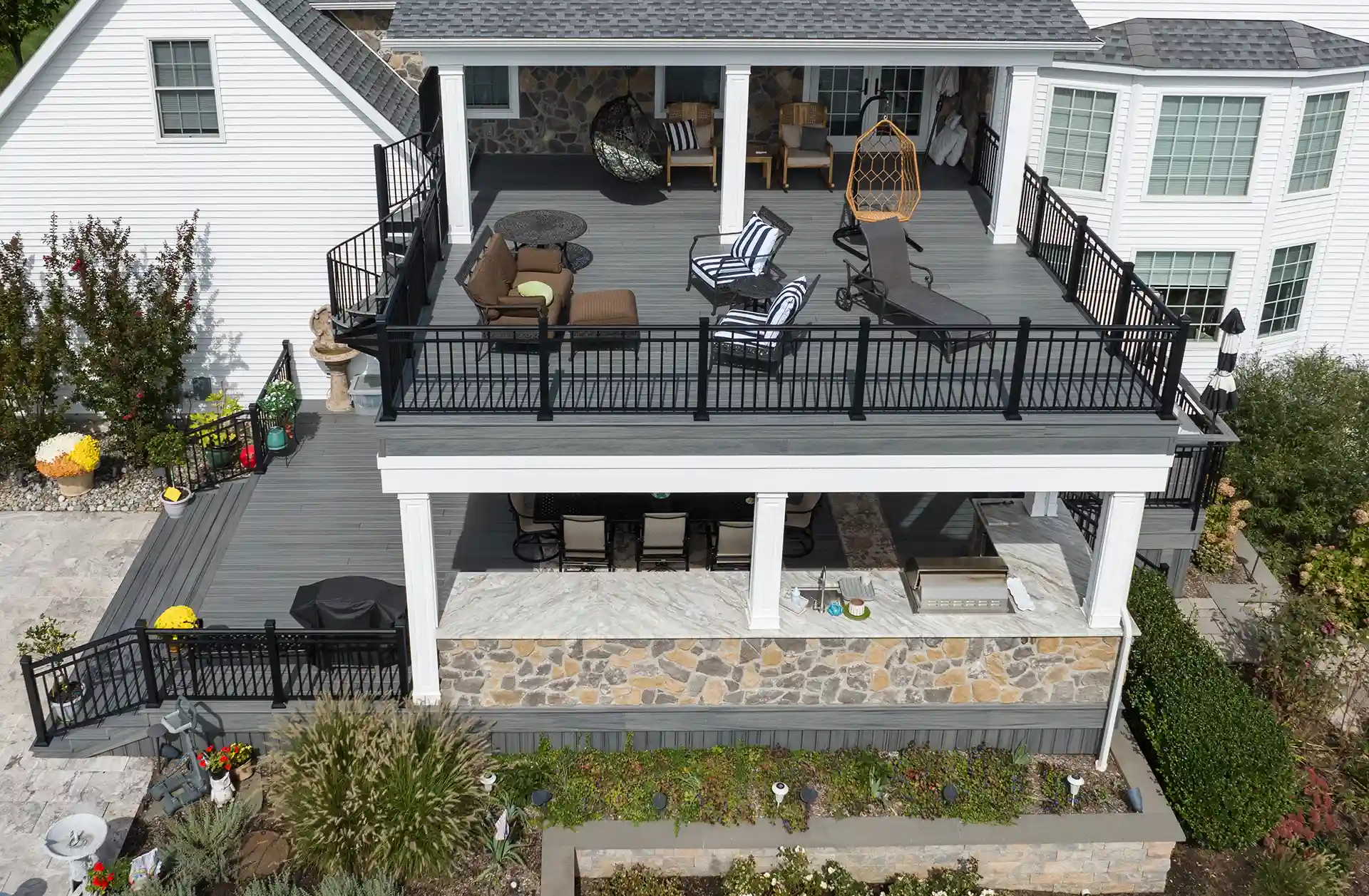 Photo of an underdeck dryspace area featuring an outdoor kitchen.