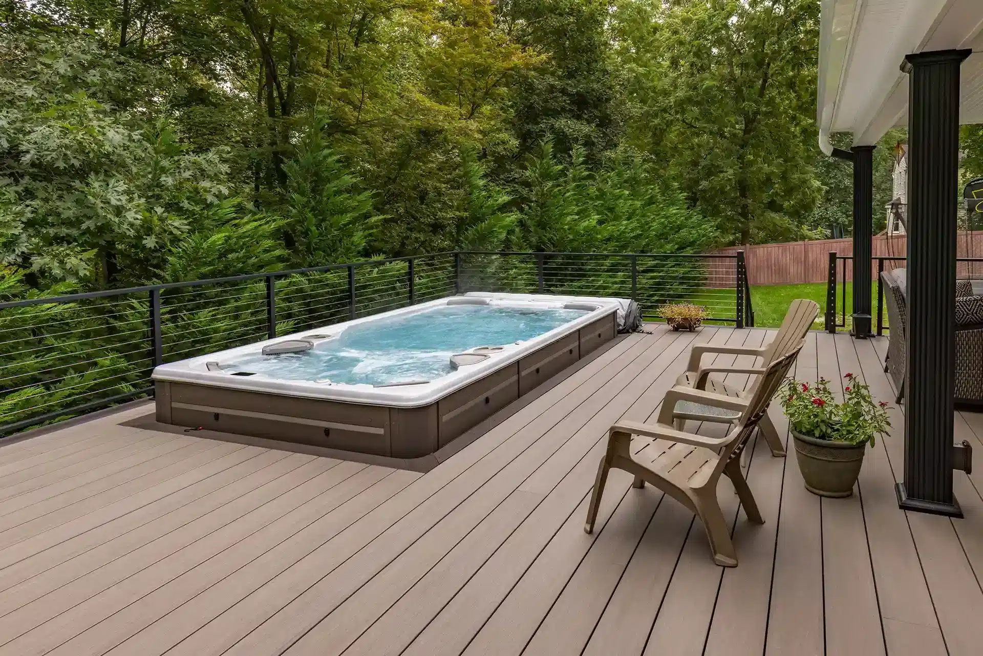 Photo of a composite deck that also serves as a swim/spa deck.