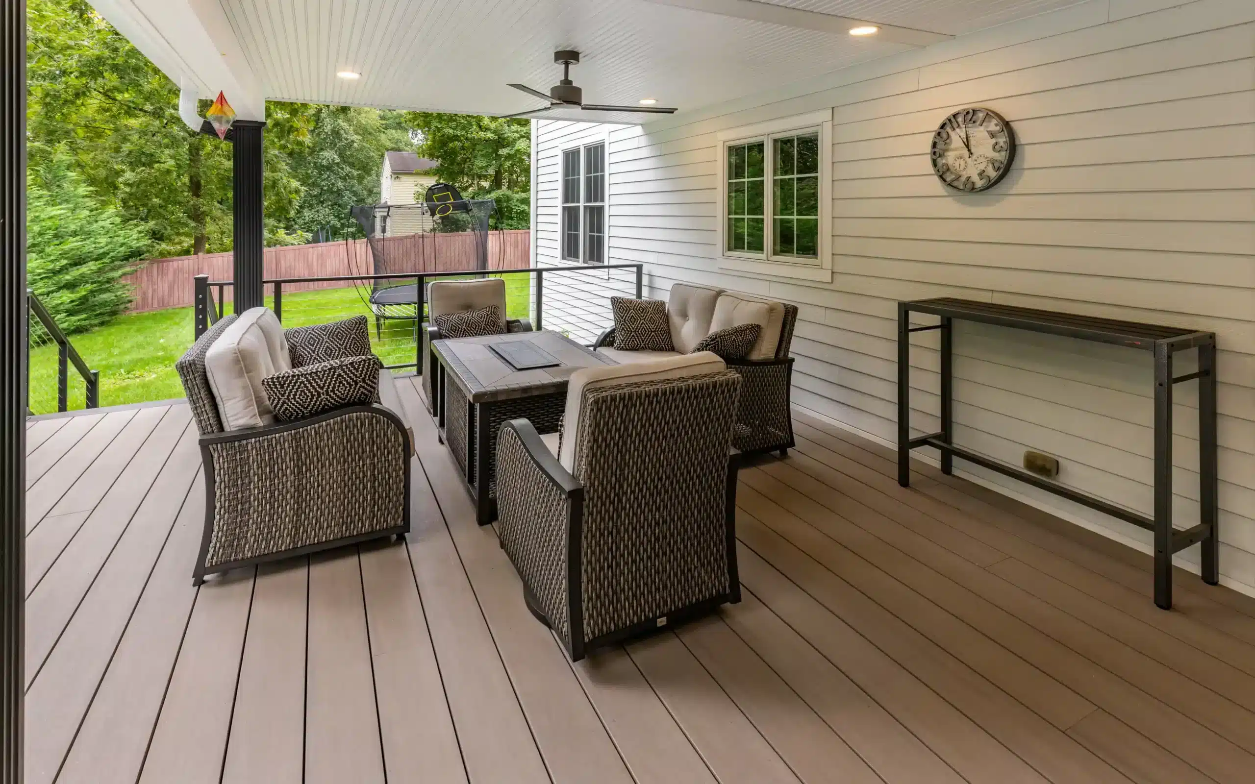 azek deck contractor in central new jersey Photo of a covered deck with AZEK decking.